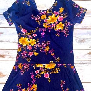 Facebook small shop called Macy Kate Boutique. Navy floral skirted Leo
